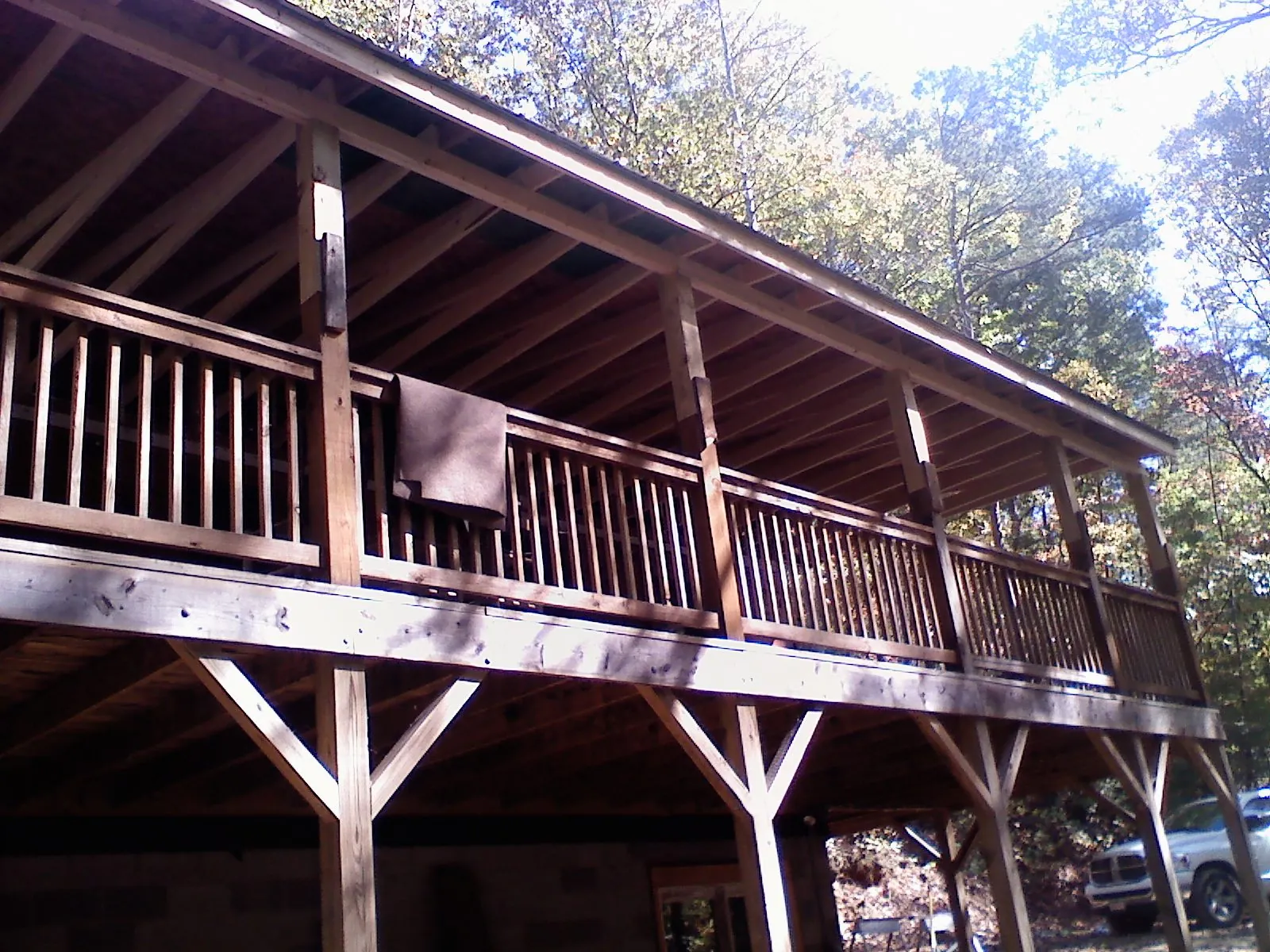 Timber framing under a new elevated porch and deck — Roof Leak Repair in Hines by Roofing Brothers